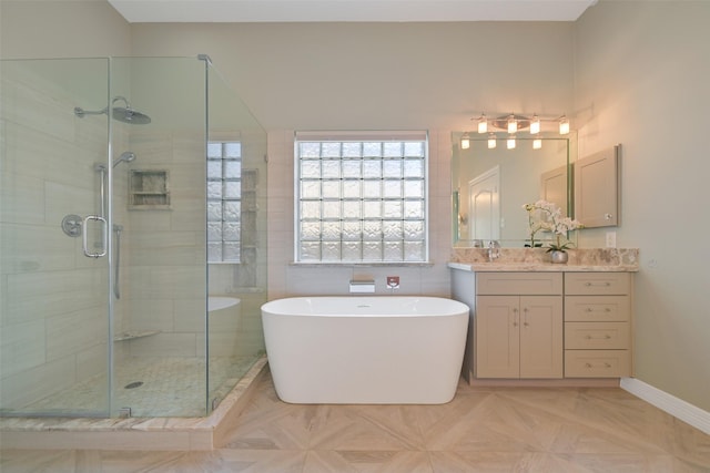 314 Del Monte Dr, Friendswood, TX 77546 - bathroom featuring vanity, a shower stall, and a freestanding bath