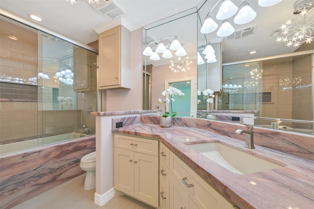 314 Del Monte Dr, Friendswood, TX 77546 - bathroom with combined bath / shower with glass door, toilet, vanity, visible vents, and a chandelier