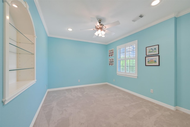 314 Del Monte Dr, Friendswood, TX 77546 - spare room with carpet floors, visible vents, and crown molding