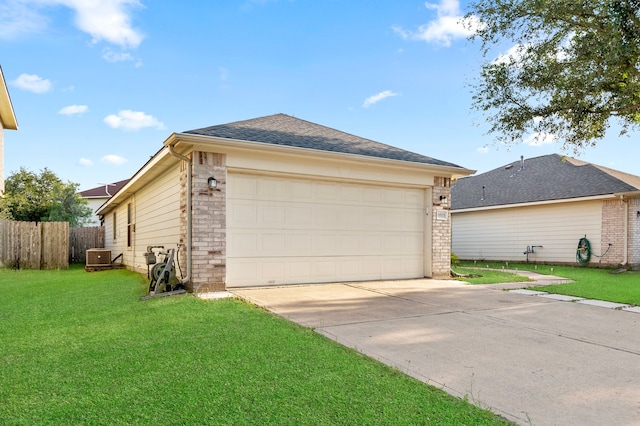 19515 Buckland Park Dr, Katy, TX 77449 - view of property exterior featuring a lawn, an attached garage, driveway, and fence