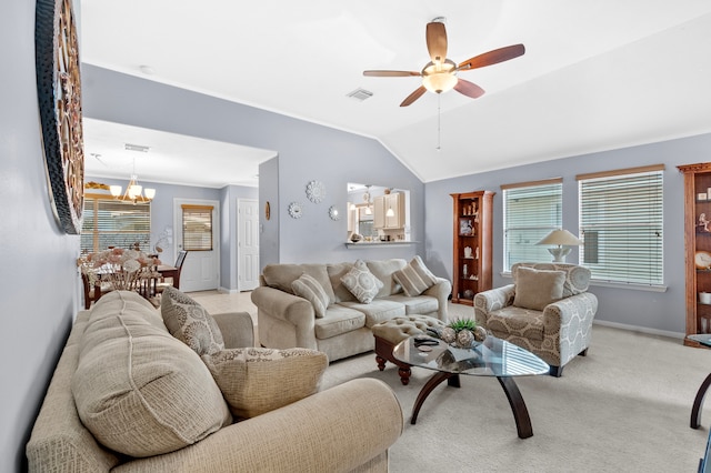 19515 Buckland Park Dr, Katy, TX 77449 - living area with vaulted ceiling, ceiling fan with notable chandelier, light carpet, baseboards, and visible vents