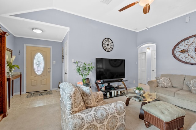 19515 Buckland Park Dr, Katy, TX 77449 - living room with light carpet, arched walkways, visible vents, baseboards, and ceiling fan