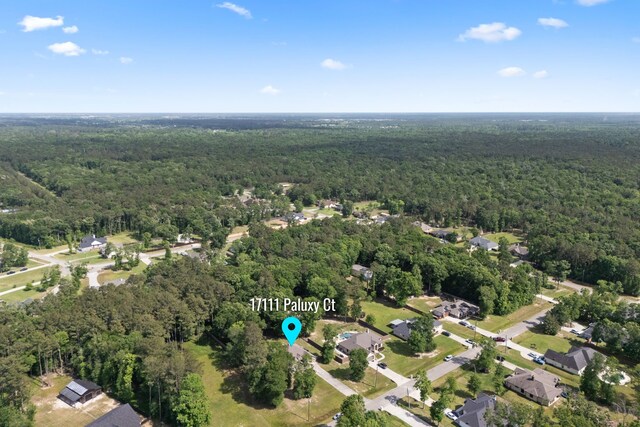 17111 Paluxy Ct, Splendora, TX 77372 - aerial view of property's location featuring a heavily wooded area