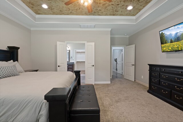 17111 Paluxy Ct, Splendora, TX 77372 - bedroom featuring a raised ceiling, carpet flooring, ornamental molding, baseboards, and ceiling fan