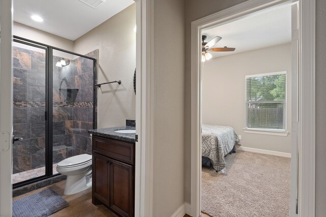 17111 Paluxy Ct, Splendora, TX 77372 - full bath featuring toilet, a stall shower, vanity, and ceiling fan