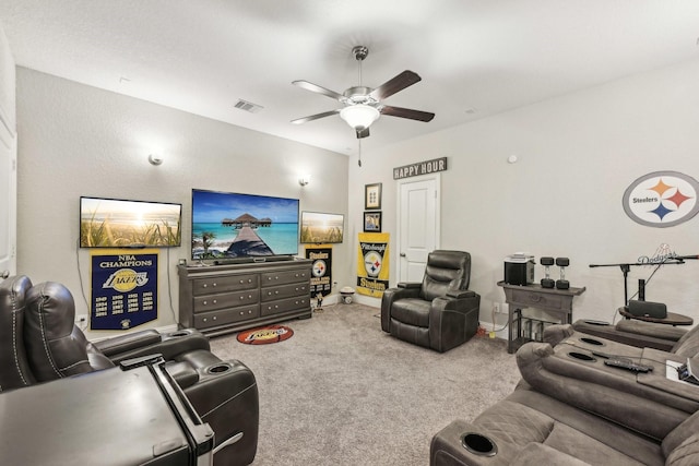 living room with carpet floors, baseboards, a ceiling fan, and visible vents