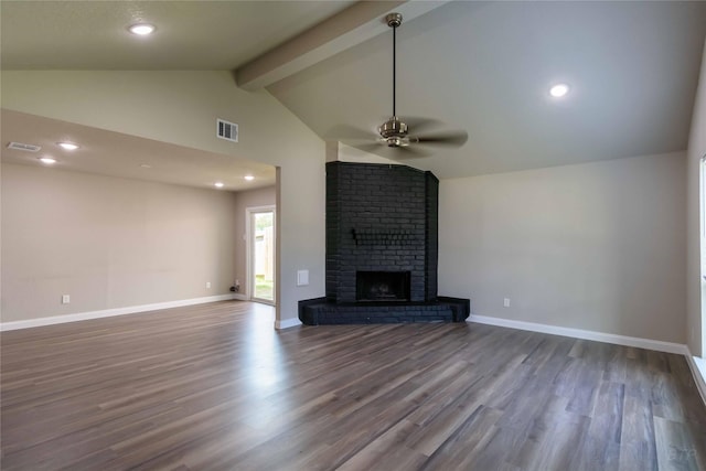 unfurnished living room with dark wood-type flooring, visible vents, a ceiling fan, and vaulted ceiling with beams