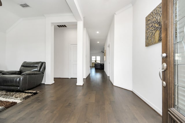 entryway featuring recessed lighting, dark wood-style floors, visible vents, ornamental molding, and baseboards