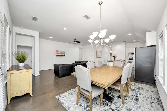 dining space featuring recessed lighting, visible vents, light wood finished floors, and ceiling fan with notable chandelier