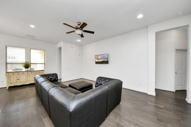 living room with baseboards, dark wood-style flooring, a ceiling fan, and recessed lighting