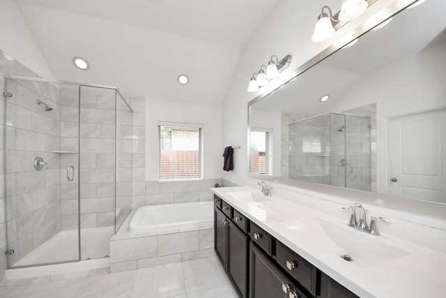 full bath with recessed lighting, a shower stall, a garden tub, and a sink