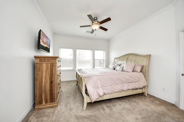 bedroom featuring a ceiling fan, light carpet, crown molding, and baseboards