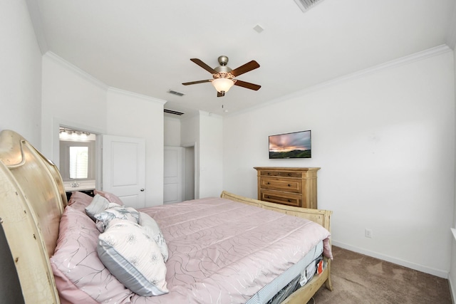 carpeted bedroom featuring ceiling fan, baseboards, ornamental molding, and visible vents