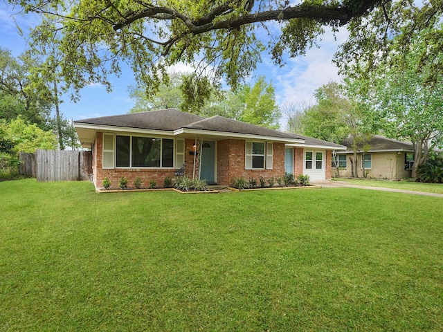 9710 Bassoon Dr, Houston, TX 77025 - single story home with fence, a front lawn, and brick siding