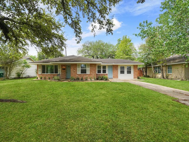 9710 Bassoon Dr, Houston, TX 77025 - ranch-style home with brick siding, a front yard, and concrete driveway