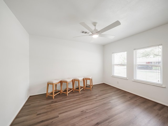 9710 Bassoon Dr, Houston, TX 77025 - spare room featuring wood finished floors, visible vents, and ceiling fan