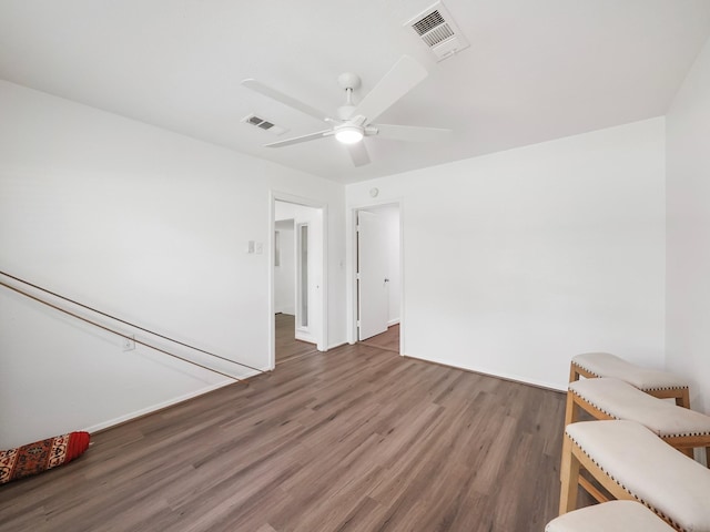 9710 Bassoon Dr, Houston, TX 77025 - living room featuring wood finished floors, visible vents, and ceiling fan
