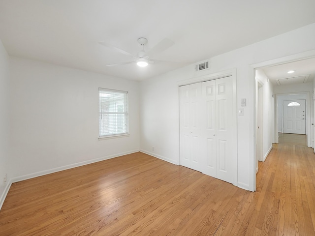 9710 Bassoon Dr, Houston, TX 77025 - unfurnished bedroom featuring a closet, light wood-type flooring, ceiling fan, baseboards, and visible vents
