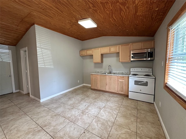 kitchen with white electric stove, vaulted ceiling, light brown cabinets, a sink, and stainless steel microwave