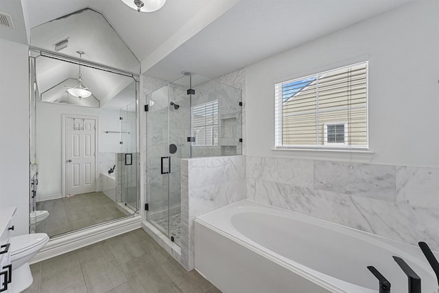 bathroom with vaulted ceiling, a stall shower, a bath, toilet, and visible vents