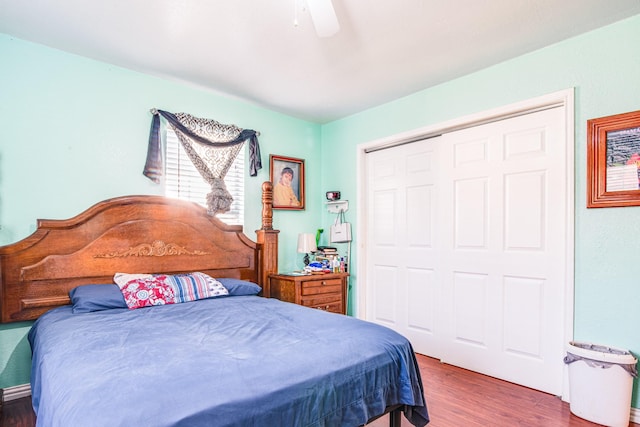 611 N Gaillard St, Baytown, TX 77520 - bedroom featuring a ceiling fan, wood finished floors, and a closet