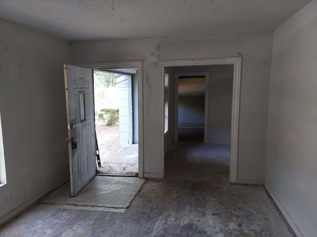 720 Macarthur Ave, Wake Village, TX 75501 - foyer with a textured ceiling
