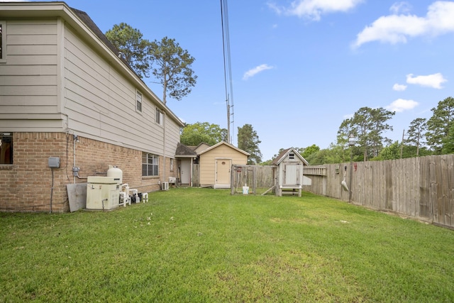 13018 Lentando Ln, Cypress, TX 77429 - view of yard featuring a storage unit and an outdoor structure