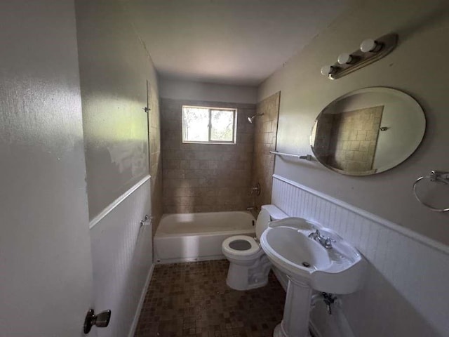3508 N Robison Rd, Texarkana, TX 75501 - full bathroom with a wainscoted wall, a shower, and toilet