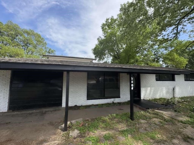 3508 N Robison Rd, Texarkana, TX 75501 - view of front of property featuring brick siding and a garage