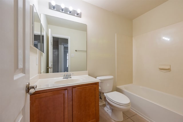 bathroom featuring vanity, tile patterned flooring, toilet, and tub / shower combination