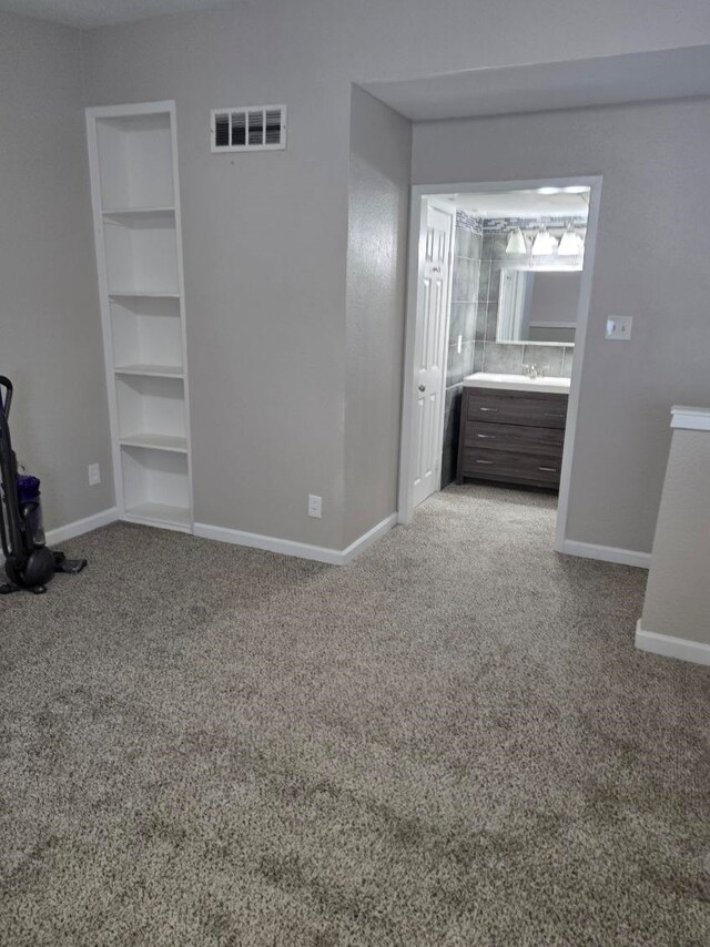 10501 S Dr Unit 301, Houston, TX 77099 - unfurnished bedroom featuring carpet floors and baseboards