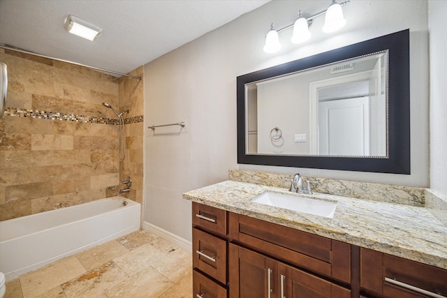 full bathroom with baseboards, bathtub / shower combination, and vanity