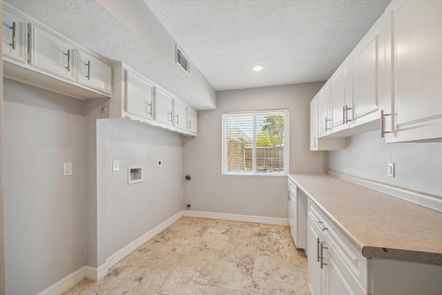 laundry room with cabinet space, electric dryer hookup, hookup for a gas dryer, baseboards, and hookup for a washing machine