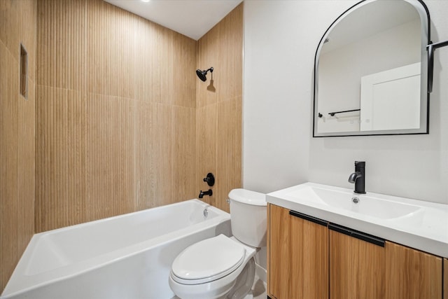 bathroom with toilet, vanity, and shower / bath combination