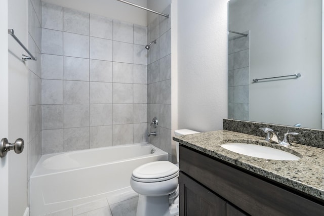 full bathroom featuring toilet, vanity, and  shower combination