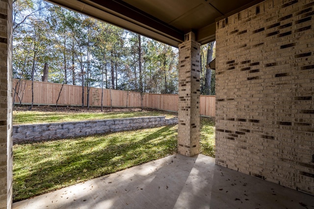 view of yard with a fenced backyard and a patio area