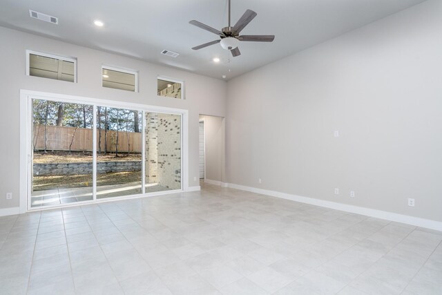 empty room featuring baseboards, a ceiling fan, visible vents, and recessed lighting