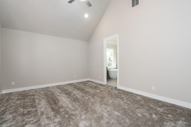interior space featuring carpet, visible vents, baseboards, high vaulted ceiling, and ceiling fan