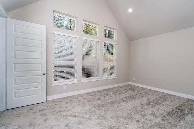 interior space with vaulted ceiling, baseboards, and recessed lighting