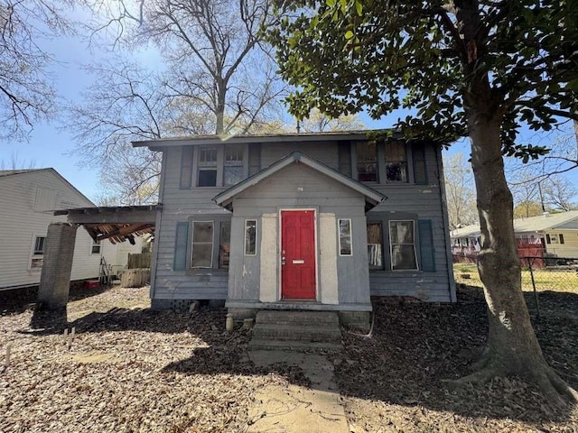 view of front of house with fence and entry steps