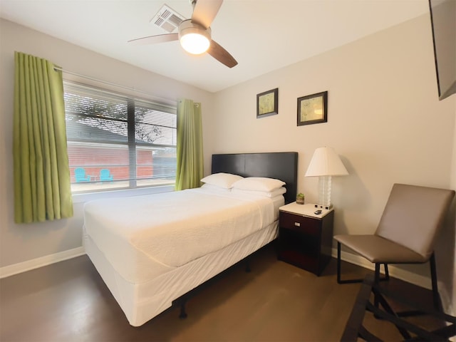 8423 Glen Valley Dr, Houston, TX 77061 - bedroom featuring baseboards, ceiling fan, and dark wood-style flooring