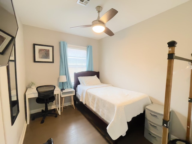 8423 Glen Valley Dr, Houston, TX 77061 - bedroom with baseboards, ceiling fan, and wood finished floors
