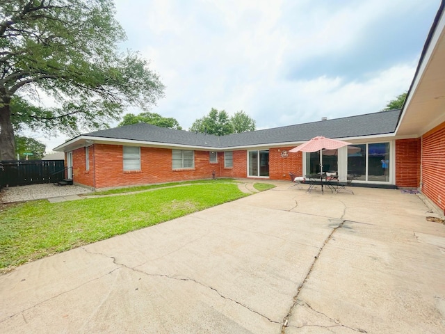 8423 Glen Valley Dr, Houston, TX 77061 - rear view of house featuring a patio and brick siding