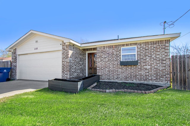 ranch-style home featuring an attached garage, concrete driveway, a front lawn, and fence