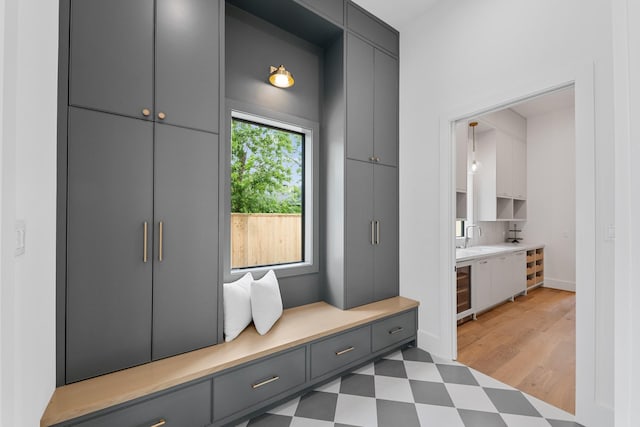 216 W 31st St, Houston, TX 77018 - mudroom featuring light floors, a sink, and wine cooler