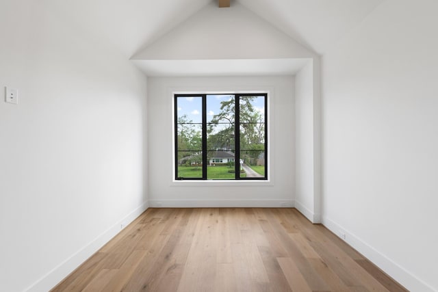 216 W 31st St, Houston, TX 77018 - unfurnished room with light wood finished floors, baseboards, and vaulted ceiling
