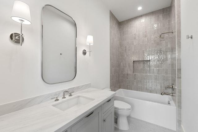 216 W 31st St, Houston, TX 77018 - bathroom featuring toilet, vanity, tub / shower combination, tile patterned floors, and recessed lighting