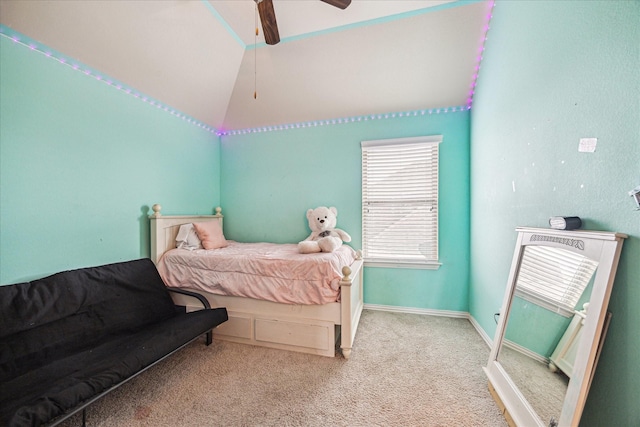 bedroom featuring vaulted ceiling, carpet floors, and ceiling fan