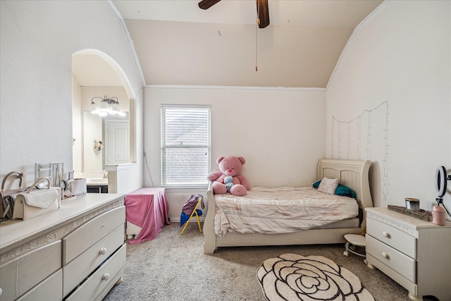 bedroom with lofted ceiling, ceiling fan, ornamental molding, and light colored carpet