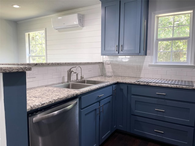 kitchen featuring blue cabinets, a sink, a wall unit AC, decorative backsplash, and dishwasher